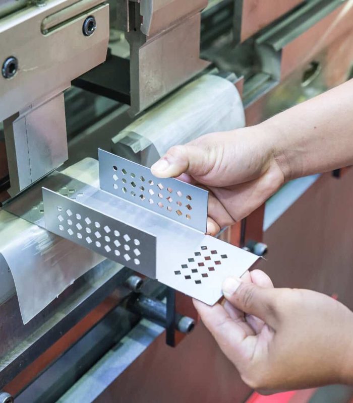 Worker at manufacture workshop operating cidan folding machine